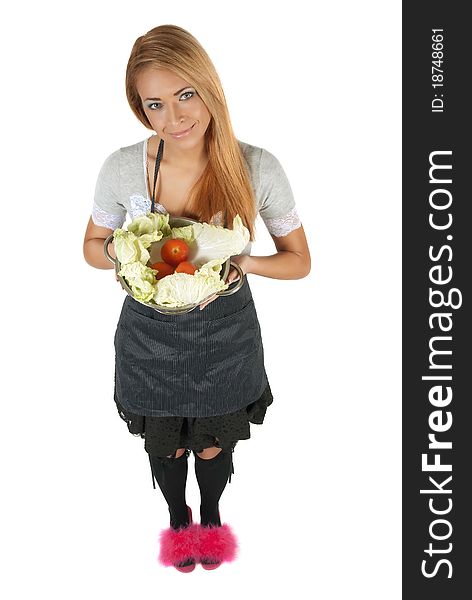 Portrait of happy young woman holding a Pot full of groceries on white background