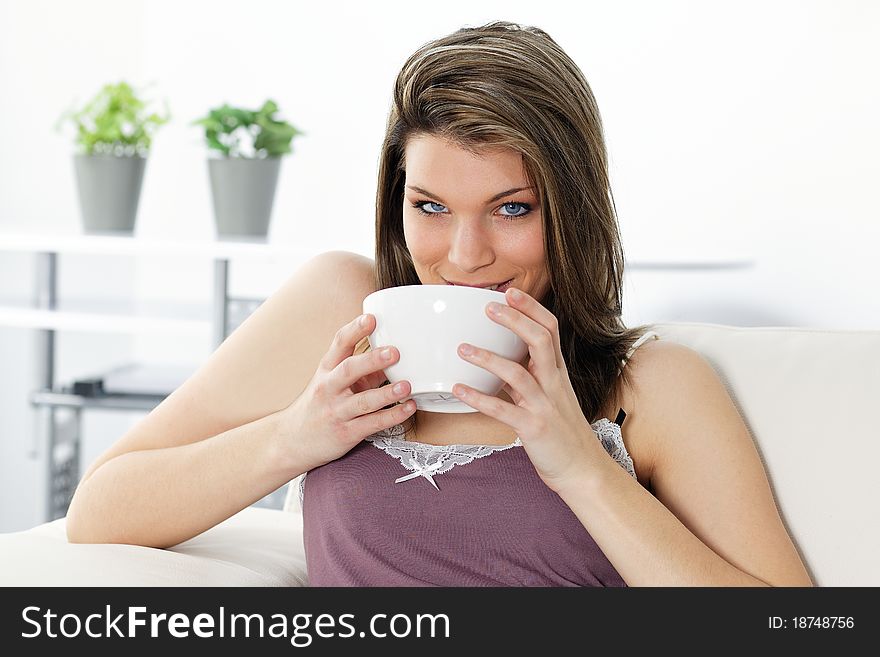 Beautiful blond woman drinking coffee. Beautiful blond woman drinking coffee