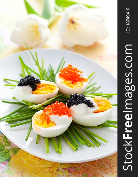 eggs with red and black caviar