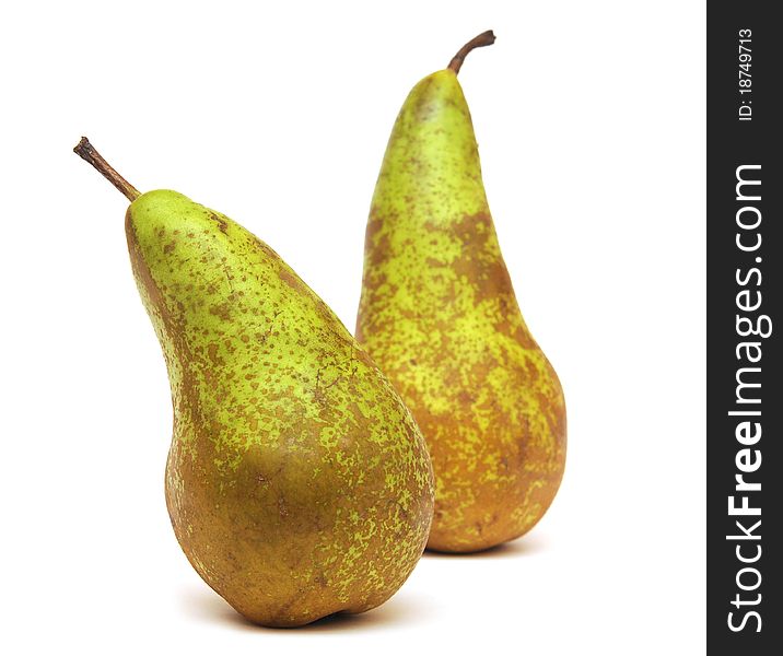 Two fresh green pear on white