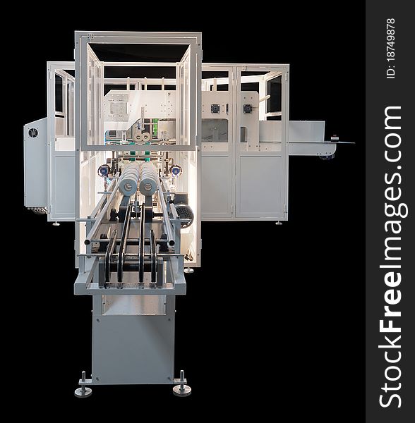 Packaging machine for rolls, serviettes and handkerchiefs.