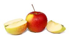 Cut Apple Is In Drops Royalty Free Stock Image