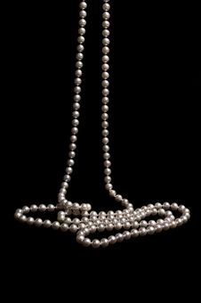 Pearl Beads On A Black Royalty Free Stock Images