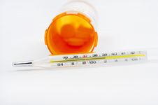 Thermometer And Pill Bottle Stock Images Thermometer And Pill Bottle Stock Images