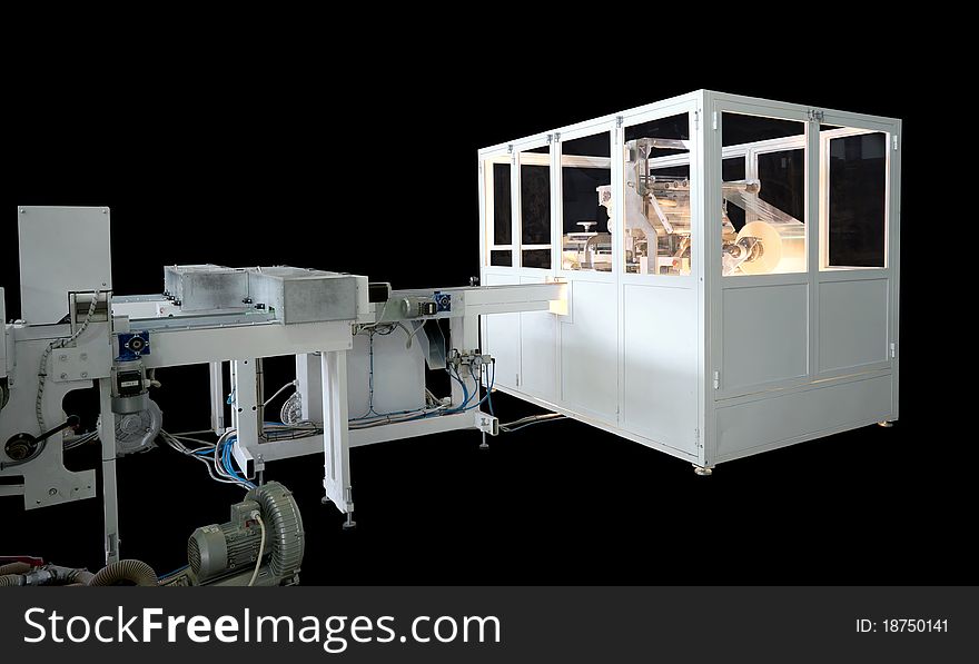 Packaging machine for rolls, serviettes and handkerchiefs.