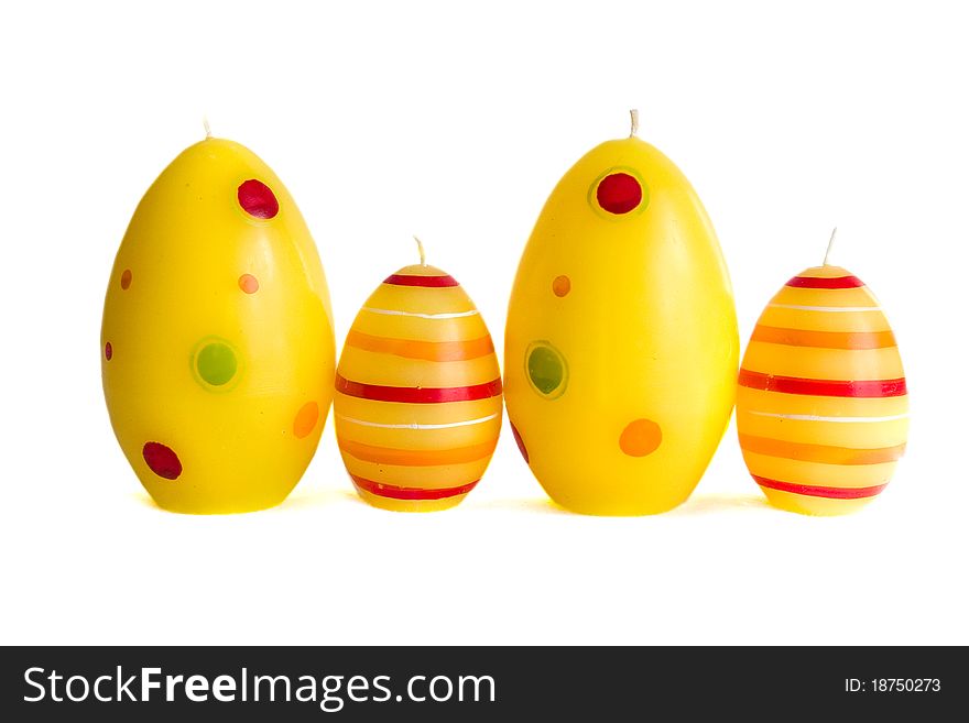 Easter candle yellow and red Eggs. Easter candle yellow and red Eggs