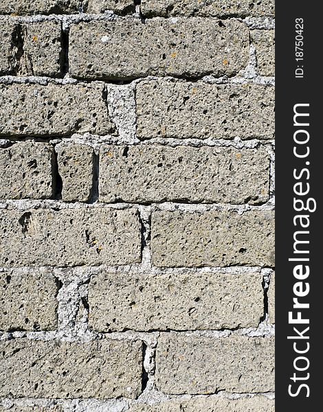 Bricked, texturized wall background, close up view