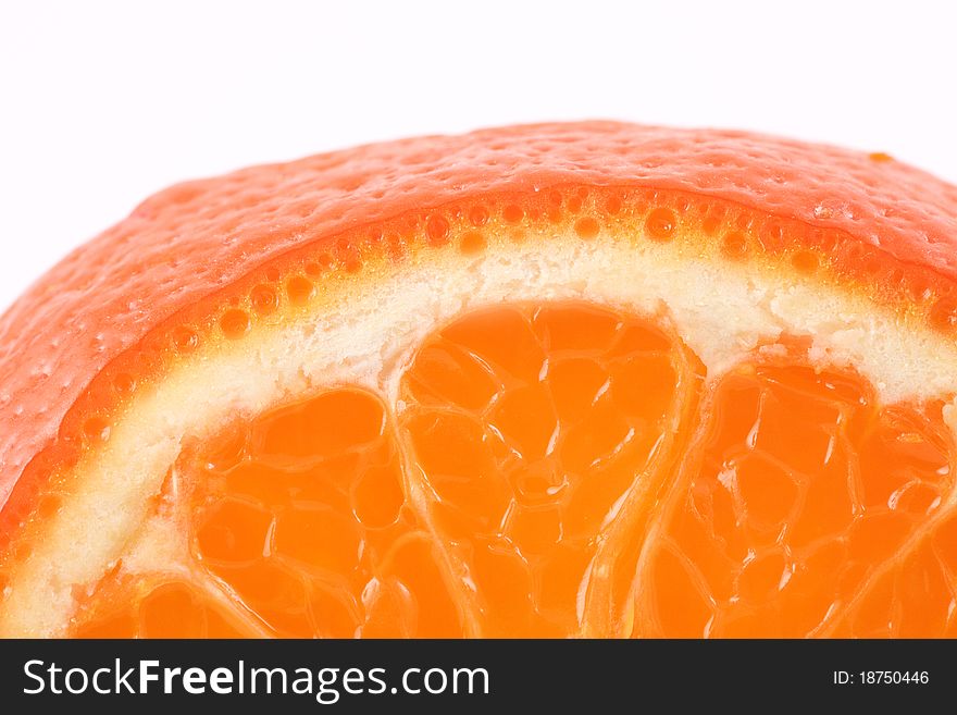 Sliced â€‹â€‹ripe juicy orange closeup on white background
