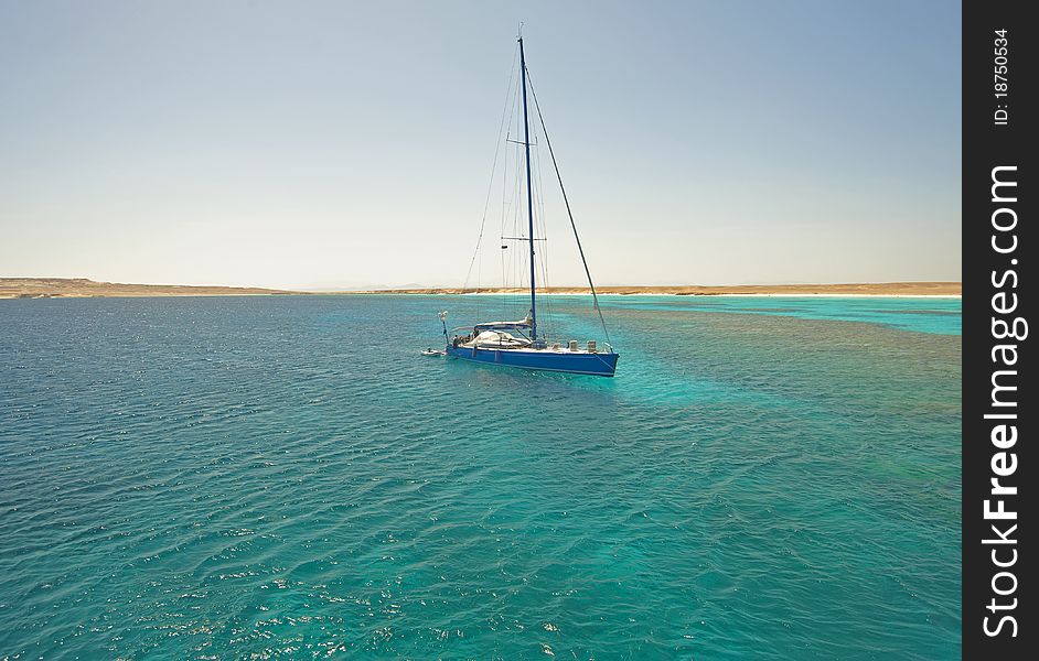 Large Sailing Yacht In A Tropical Lagoon