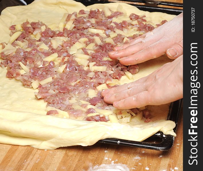 Raw meat pie is ready to bake in oven stove