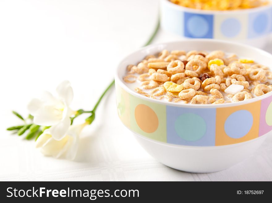 Oat Hoops cereals with milk in a bowl