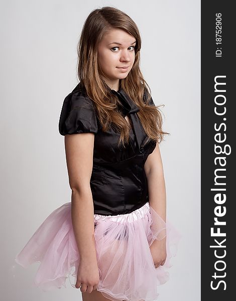 Young Girl In A Pink Skirt