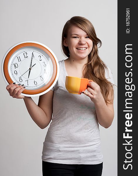 Portrait Of A Girl With A Cup And A Clock