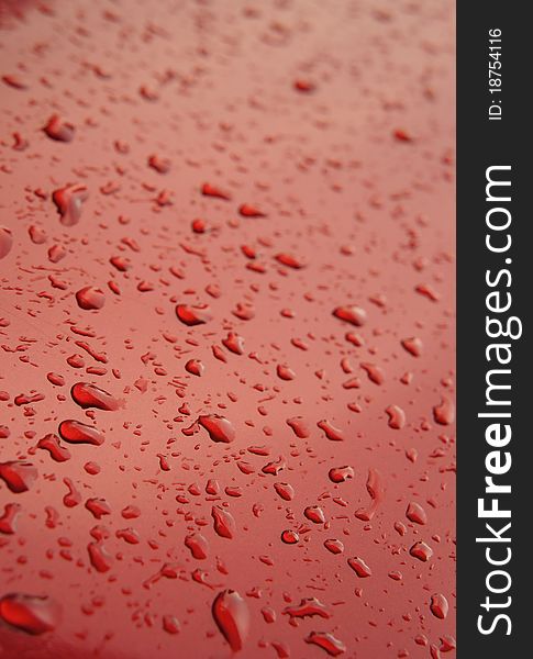 Red water drops background texture