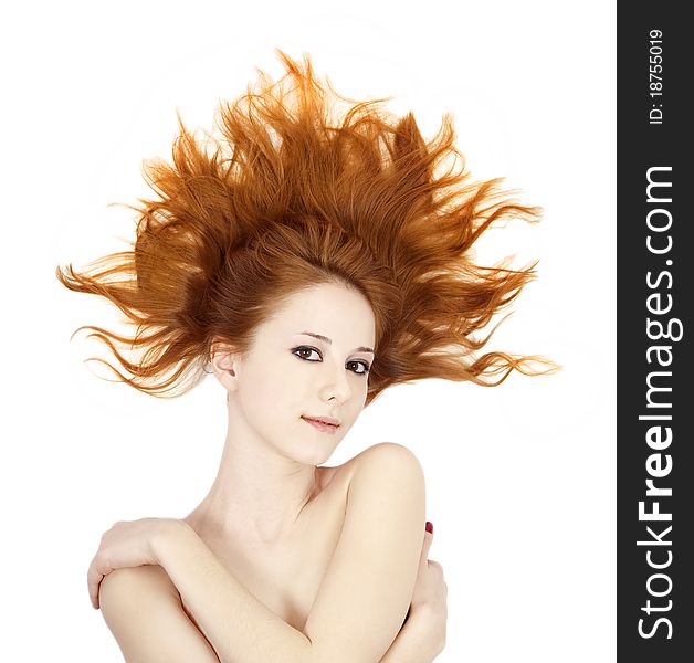 Beautiful red-haired girl. Studio shot.