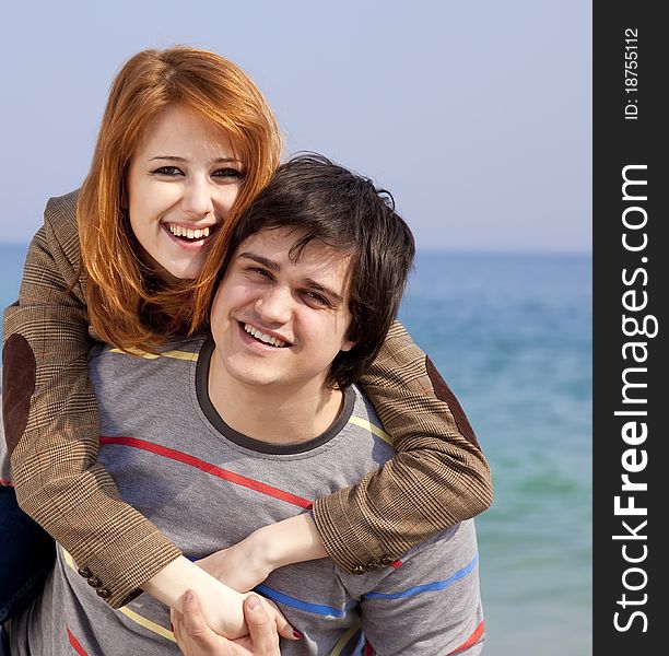 Young couple having fun on the beach.