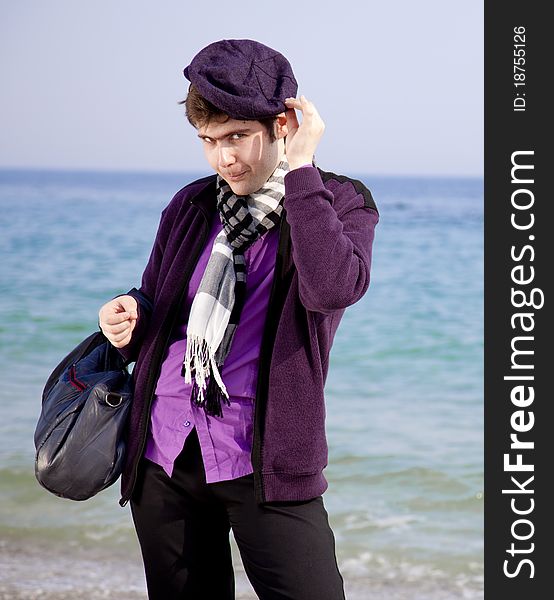 Style men in violet at the beach. Outdoor.