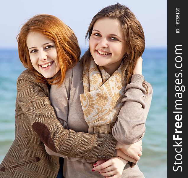 Two Happy Girls At Spring Beach.