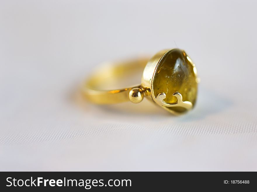 Macro of gold ring isolated on white background. Macro of gold ring isolated on white background
