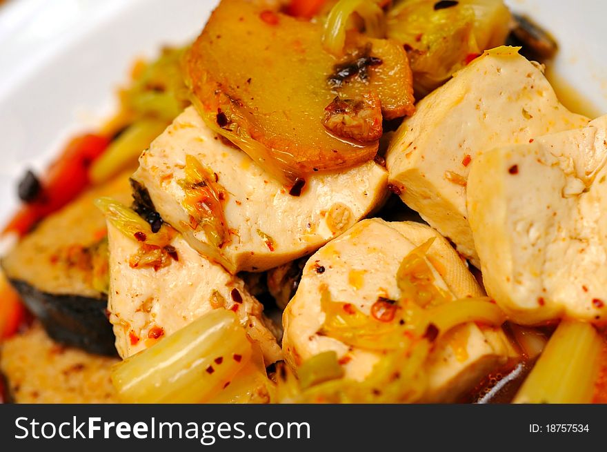 Macro shot of Asian style bean curd dish. Macro shot of Asian style bean curd dish.