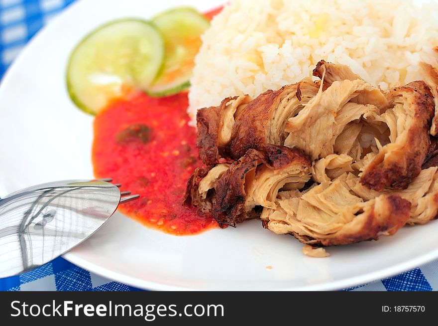 Tasty chicken rice delicacy made from vegetarian ingredients. Chicken rice is a local delicacy of Singapore. Tasty chicken rice delicacy made from vegetarian ingredients. Chicken rice is a local delicacy of Singapore.