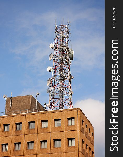 Broadcaster or transmitter center with tower and telecommunication satelites. Broadcaster or transmitter center with tower and telecommunication satelites