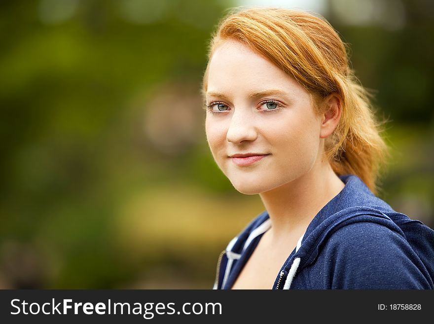 Portrait of a Young woman outside