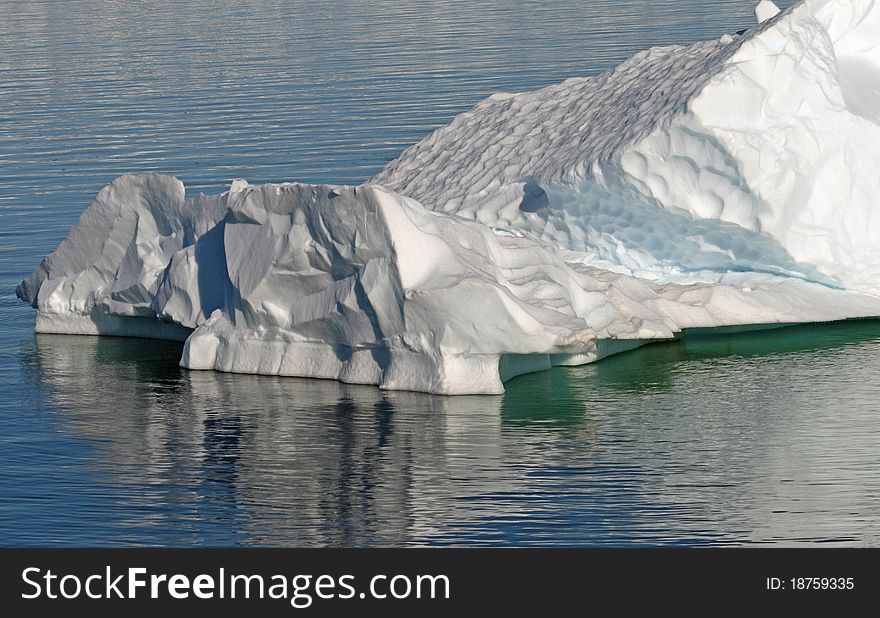 Iceberg floating in sea in Antarctica