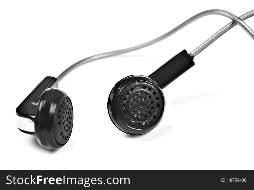 A Pair of black earphones on a pure white background with space for text
