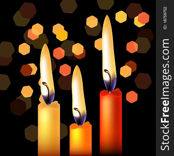 Three festive candles on night black background