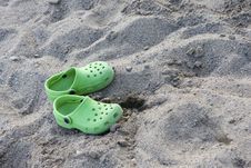 Sandals On The Sandy Beach Stock Images