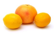 Two Lemons And Grapefruit Stock Photos