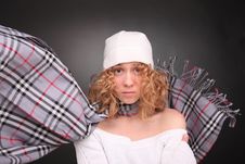 Upset Curly Woman In Hat With Scarf Waving Stock Photography Upset Curly Woman In Hat With Scarf Waving Stock Photography