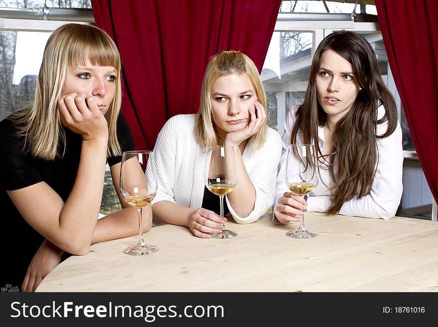 Young girls having dinner in fancy restaurant at the table