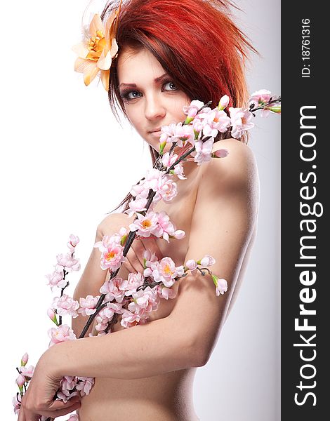 Beautiful naked woman with spring flower white