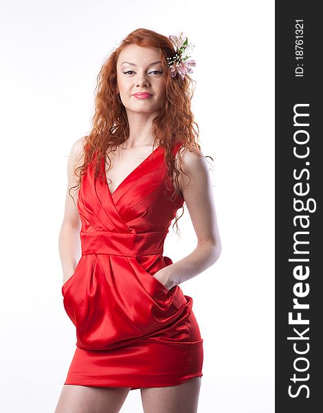 Portrait of woman in red dress with spring flowers on white. Portrait of woman in red dress with spring flowers on white