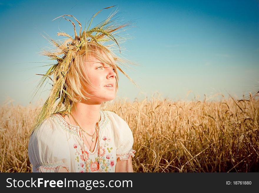 Young Woman On Wheat Field