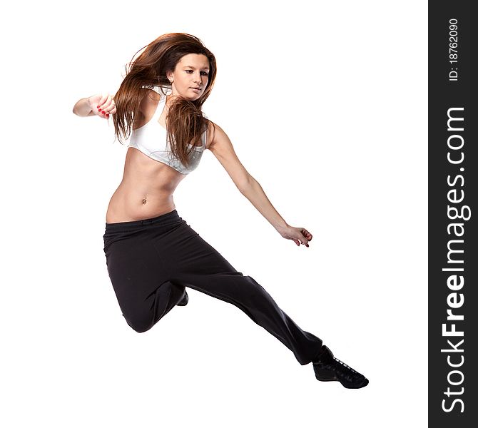 Attractive jumping woman on white