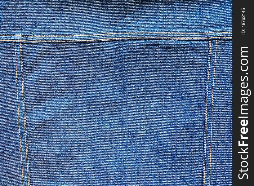 Piece of bluejeans with seam best for decor and background. Piece of bluejeans with seam best for decor and background.