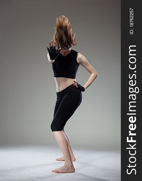 Photo of dancing attractive young woman. Photo of dancing attractive young woman