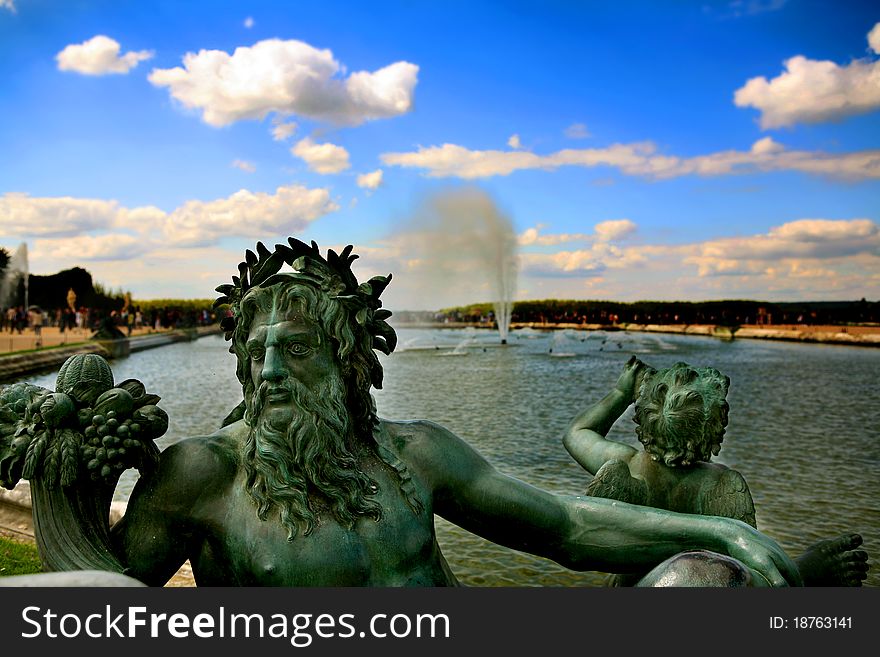 Detail of a sculpture with small lake in the park of the palace. Detail of a sculpture with small lake in the park of the palace