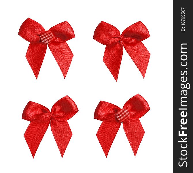 Four red ribbon bows with and without buttons. Four red ribbon bows with and without buttons