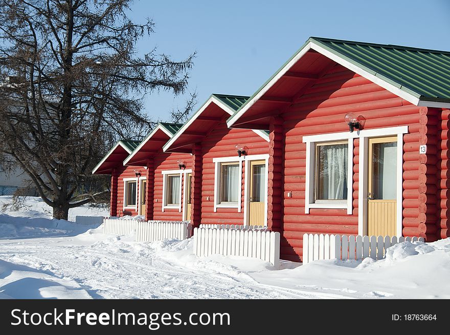 Small houses in winter wood of Finland. Small houses in winter wood of Finland.