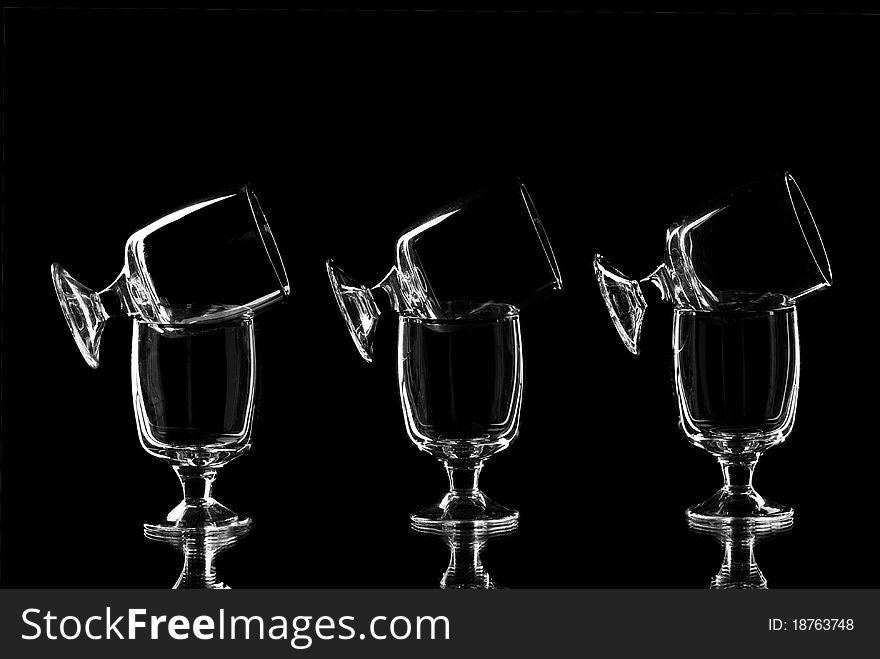Set of empty wine glasses. Black background. Studio shot.