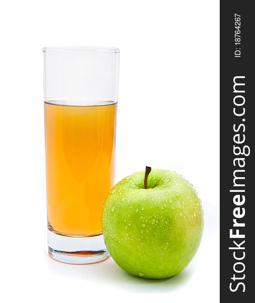 Glass of apple juice with an apple