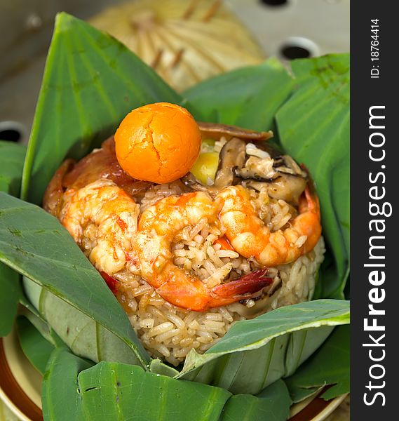Cooked rice wrapped with lotus leaf,Thai native food. Cooked rice wrapped with lotus leaf,Thai native food