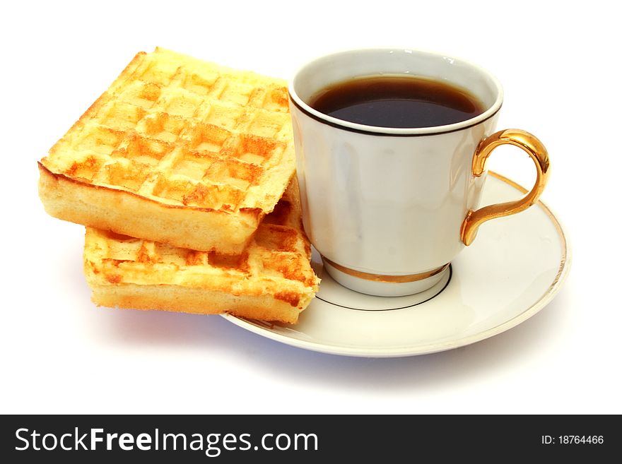 White cup of coffee isolated on white with waffle. White cup of coffee isolated on white with waffle