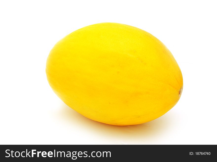 Fresh yellow melon isolated on white background