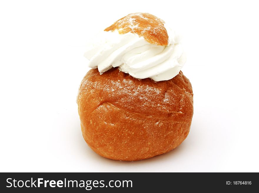 Fresh bake roll with a cream isolated on white