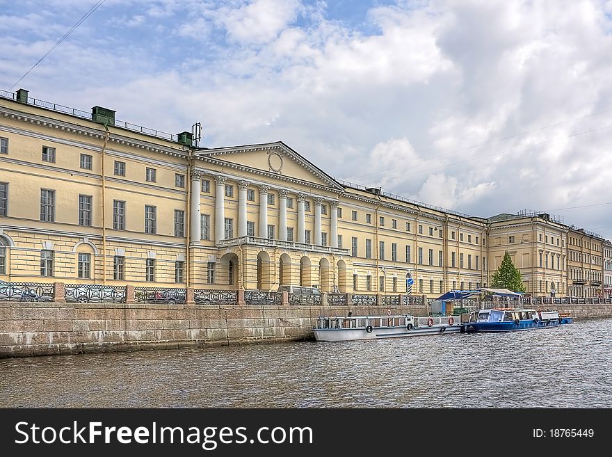 Old house on waterfront of unusual architecture, Saint Petersburg, Russia.